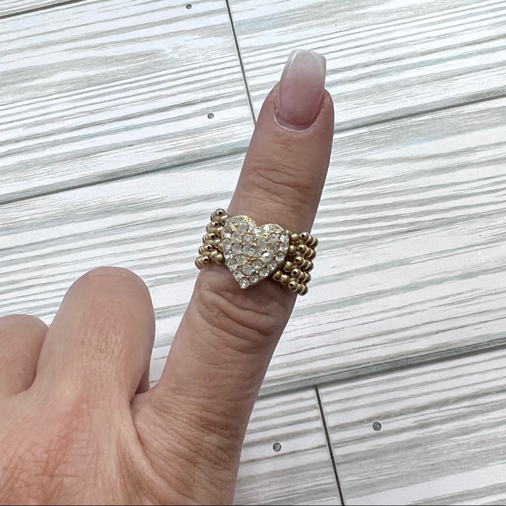 Flexible gold tone rhinestones ring size 8.5